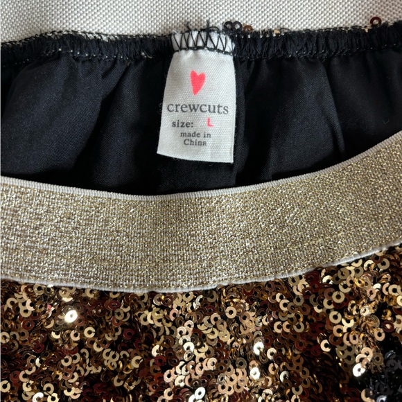 EUC Crewcuts Gold sequin skirt with black stars size L - Picture 2 of 3